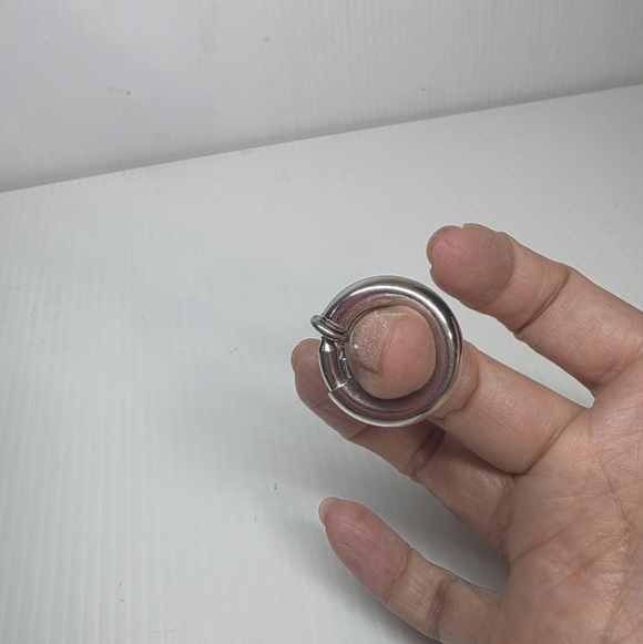 Silver toned puffy hoop huggie clip on retractable comfort Earrings - Picture 5 of 11